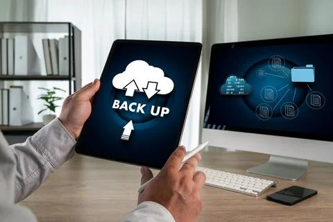 Cloud technology backup concept with a person using a tablet showing cloud .. Stock Photos