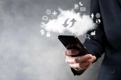 Cloud technology. cloud storage sign with two arrows up and down on dark . Cl Stock Photos