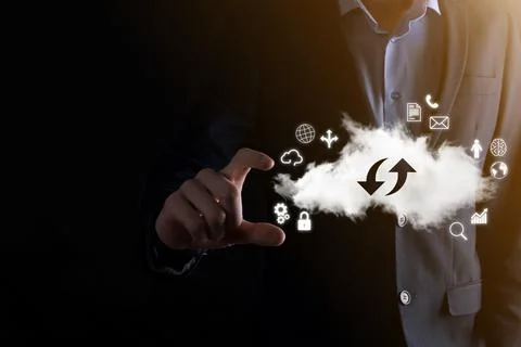 Cloud technology. cloud storage sign with two arrows up and down on dark . Cl Stock Photos