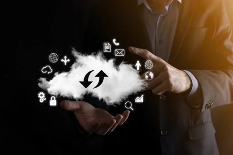 Cloud technology. cloud storage sign with two arrows up and down on dark . Cl Stock Photos