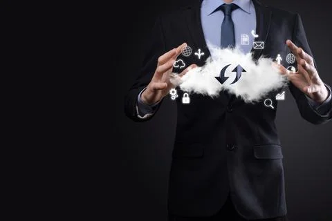 Cloud technology. cloud storage sign with two arrows up and down on dark . Cl Fotos Stock