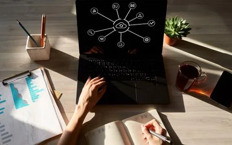 Cloud technology concept on tablet screen. Data storage and computing services. Stock Photos