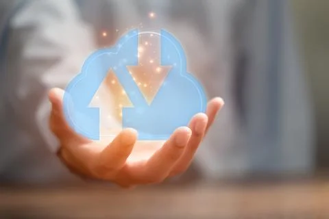 Cloud technology. Human hand holding icon cloud computing network and data in Stock Photos