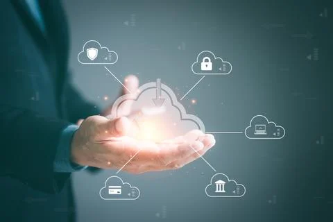 Cloud technology icon in the hands of business people Used to connect data .. Stock Photos