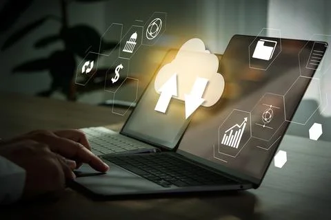 Cloud technology man use Laptop technology load cloud computing internet to.. 스톡 사진