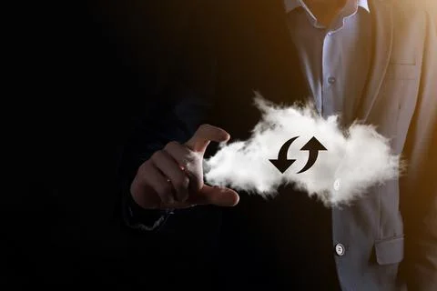 Cloud technology. Polygonal wireframe cloud storage sign with two arrows up a 写真素材