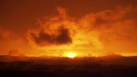 Cloud time lapse 4k. Sunset sky dramatic cumulus cloud motion time lapse. Orange Stock Footage 220648276