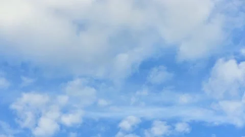 Cloud time lapse. Blue sky white clouds. Puffy fluffy white clouds. Stock Footage 141807408