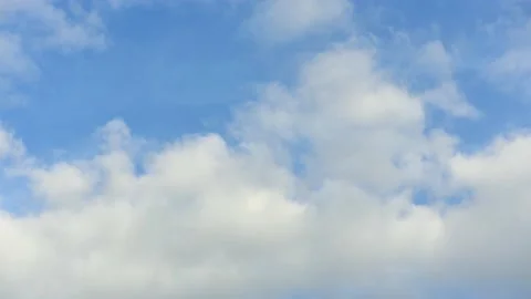 Cloud time lapse. Blue sky white clouds. Puffy fluffy white clouds. Stock Footage 141807622