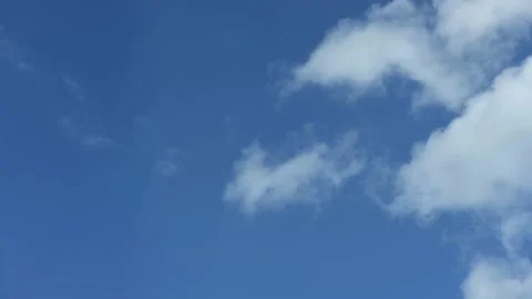 Cloud time lapse. Blue sky white clouds. Puffy fluffy white clouds. Stock Footage 154581353