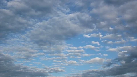 CLOUD OF TIME, LAPSE, BUILDING CLOUD OF MOVEMENT WITH BLUE SKY. Stock Footage 115524324