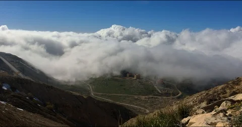 Cloud Time Lapse Over Mountain 4k UHD Stock Footage 94477483
