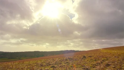 Cloud time lapse with sun breaking through Stock Footage 74480319
