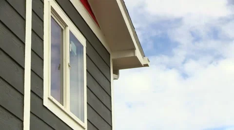 Cloud Time Lapse on Window of new House 動画素材 56871210