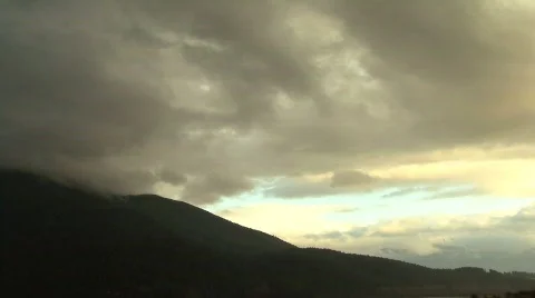 Cloud timelapse behind mountain Stock Footage 731318