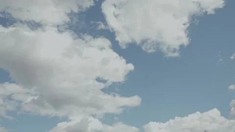 Cloud timelapse on a bright and beautiful blue sky summer day. Stock Footage 274893595
