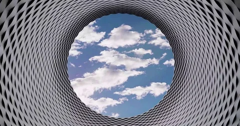 Cloud timelapse circular building of Tunnel Blue Sky Cinemagraph Video stock 102564384