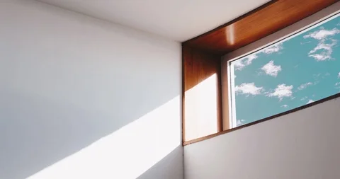 Cloud timelapse of Clear Glass Window With with a Wooden Frame - sky Cinemagraph Video stock 102564366