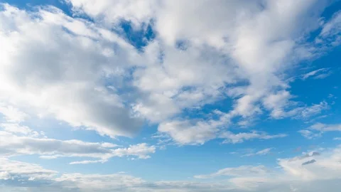 Cloud timelapse. Clouds float against the blue sky Stock Footage 118765749