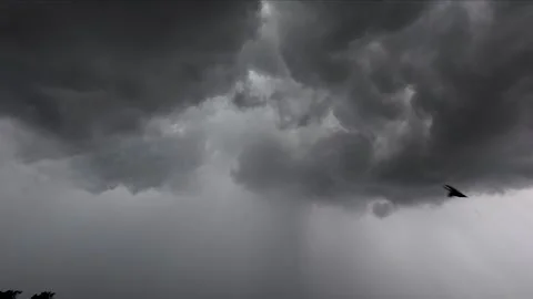 Cloud Timelapse: Fluffy Raining Black Clouds Moving Slowly 4K HDR Stock Footage 339267602
