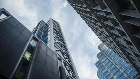 Cloud timelapse with high rise city buildings, time passing city life urban jung Stock-Footage 319428449