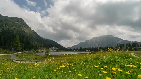 Cloud Timelapse Over an Alpine Lake Stock Footage 146333630