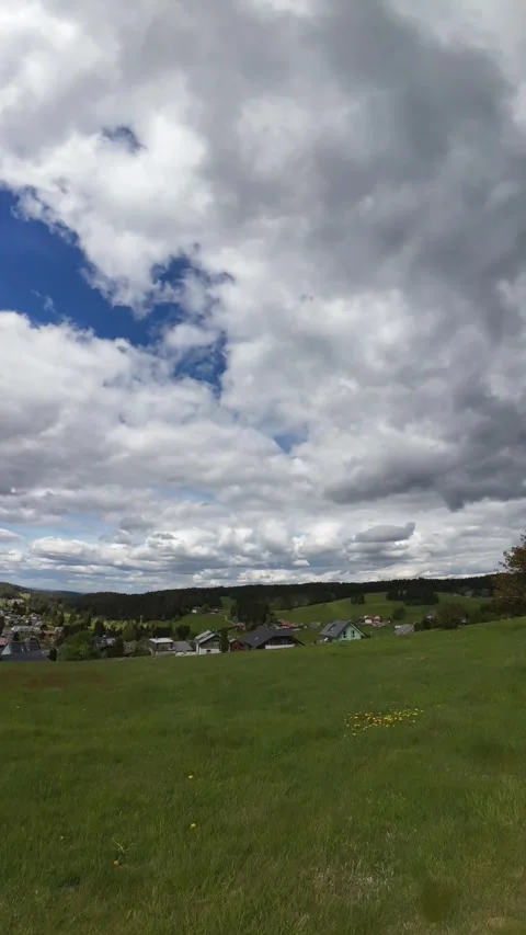 Cloud Timelapse Over Green Field Under Dramatic Moving Sky Stock Footage 335328766