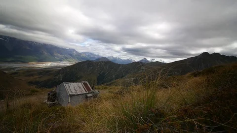 Cloud timelapse over rustic hut in New Zealands Southern Alps Stock Footage 78052727