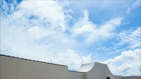 Cloud Timelapse with Rooftop background Stock Footage 11522300