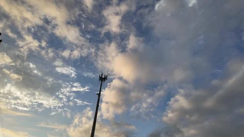CLOUD TIMELAPSE before sunset over tree tops Stock Footage 274690458