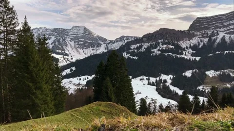 Cloud timelapse in Swiss alpine mountainside Video stock 168996495