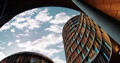 Cloud timelapse of Worm's Eye View of City Buildings - cloud Cinemagraph Video stock 102564361