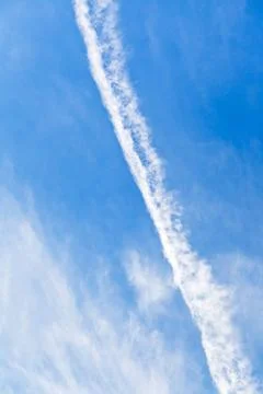 Cloud trace of plane Cloud trace of plane in blue sky Copyright: xZoonar.c... Stock Photos
