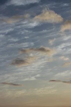 Cloud Trails at Sunset Stock Photos