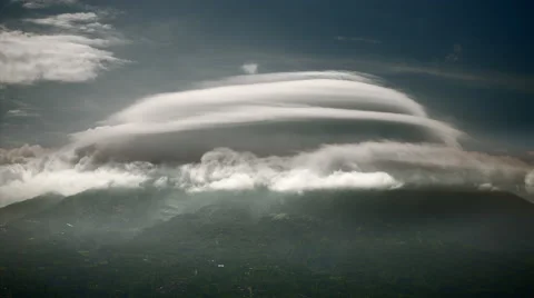 Cloud like a UFO over Mount Merapi Stock Footage 45349044