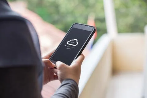 Cloud uploading concept on phone screen Stock Photos