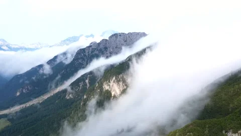 Cloud waves over mountain ridge Mangart, Slovenia - Drone video 動画素材 145879609