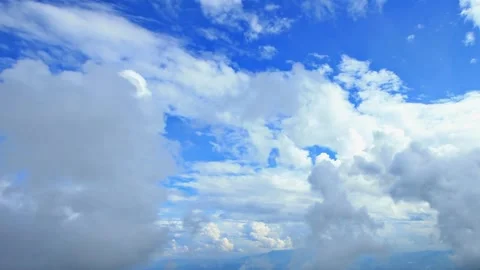 Cloud white background on air sky Timelapse cumulus clouds moving in blue sky Video stock 336568786