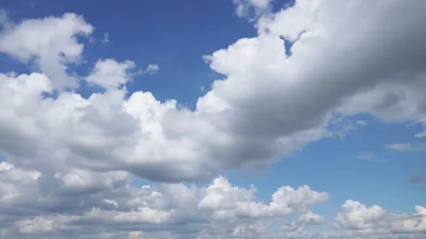 Cloud white background on air sky Timelapse cumulus clouds moving in blue sky Video stock 336568831
