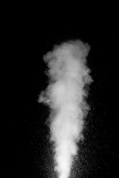 Cloud of white dust particles floating in dark air on black background. Swirl Stock-Fotos