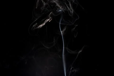 Cloud of white smoke on black background Stock Photos
