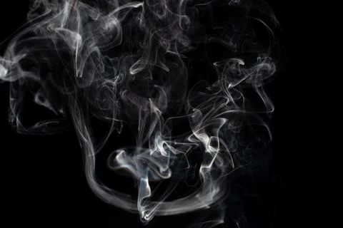 Cloud of white smoke on black background Stock Photos