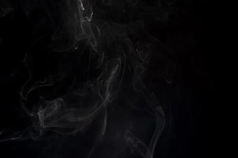 Cloud of white smoke on black background Stock Photos