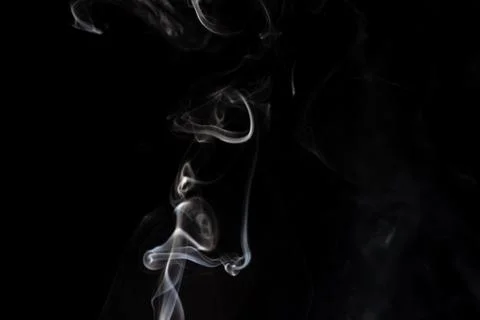 Cloud of white smoke on black background Stock Photos