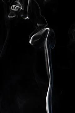 Cloud of white smoke on black background Stock Photos