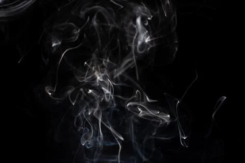 Cloud of white smoke on black background Stock Photos