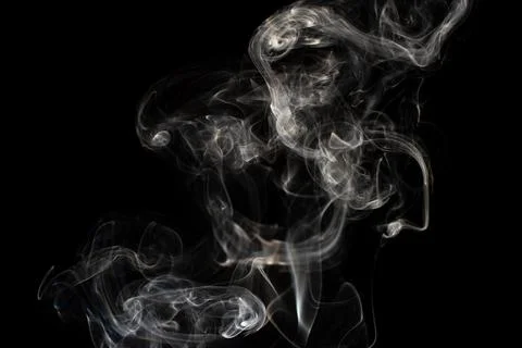 Cloud of white smoke on black background Stock Photos