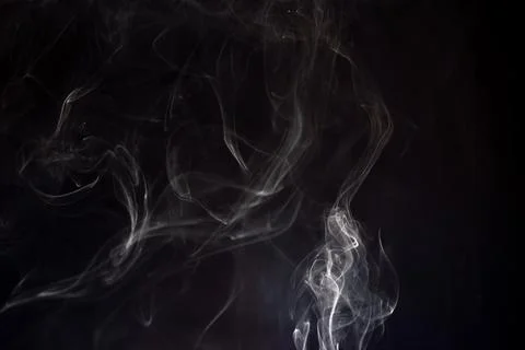 Cloud of white smoke on black background Stock Photos