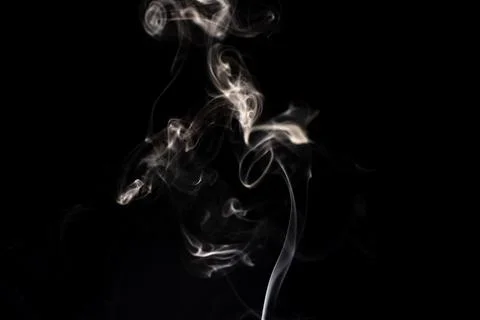 Cloud of white smoke on black background Stock Photos