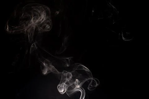 Cloud of white smoke on black background Stock Photos